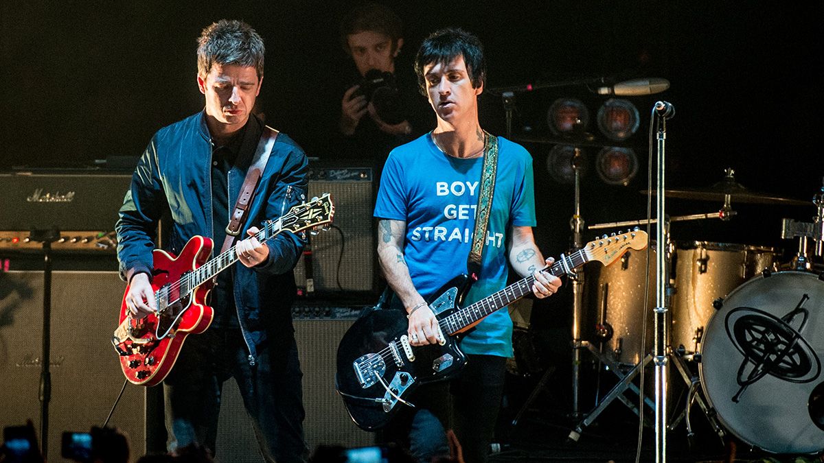 Noel Gallagher and Johnny Marr perform together as a secret surprise at the end of Johnny Marrs show Johnny Marr performs at Brixton Academy on October 23, 2014 in London, England