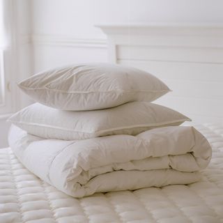 pillows and duvet on a bed