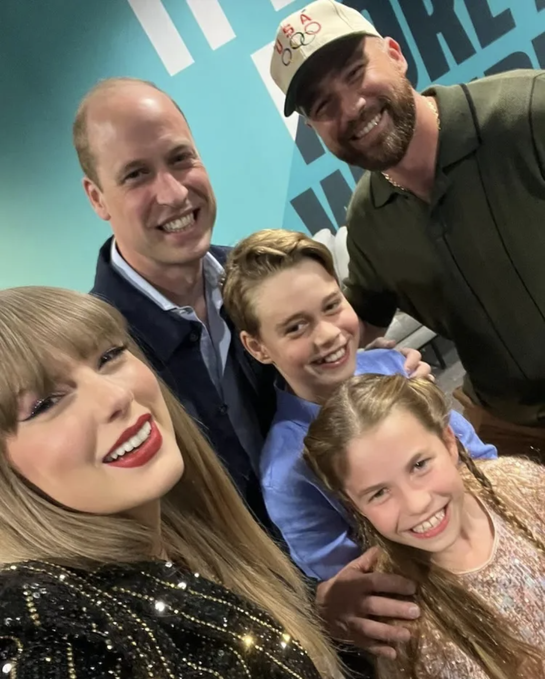 Taylor Swift and Prince William posing with Travis Kelce, Prince George and Princess Charlotte