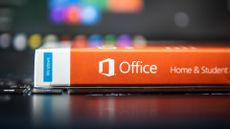 Microsoft Office software packaged in its physical form on a table 