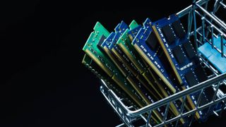 Close up view of laptop ddr memory modules in shopping cart on black background