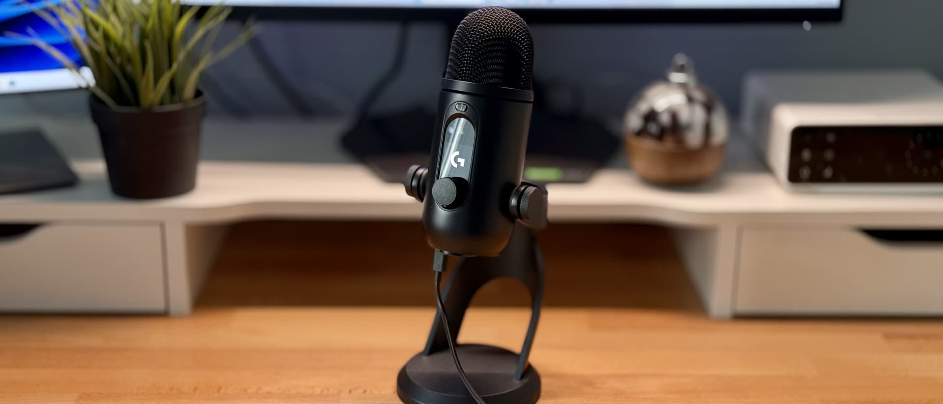 The Logitech Yeti 2 microphone on a desk.