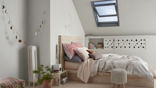 Loft bedroom with eaves shelving