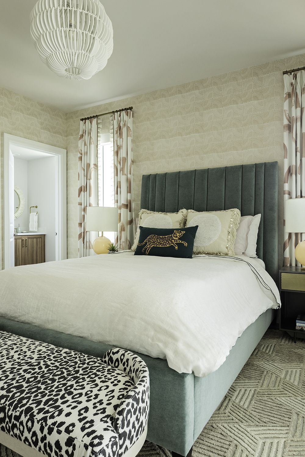 spare bedroom with animal print cushions and curtains