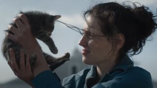 Eva Victor holding a cat in Sorry, Baby