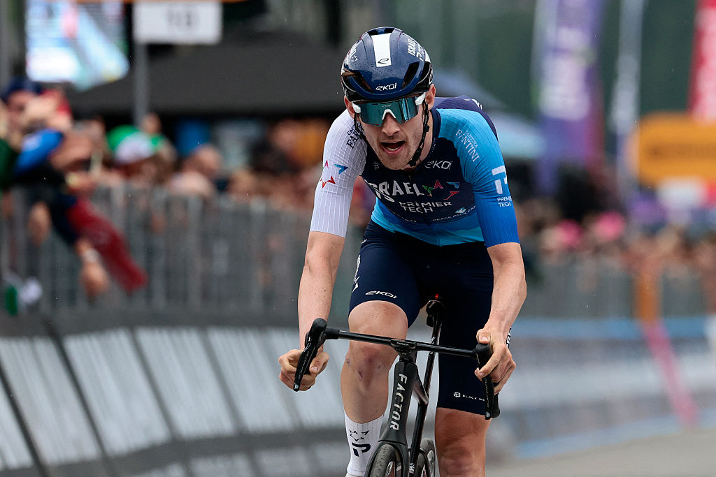 Israel-Premier Tech's Canadian rider Derek Gee crosses the finish line of the 17th stage of the 108th Giro d'Italia cycling race, 155kms from San Michele all'Adige to Bormio, on May 28, 2025. (Photo by Luca Bettini / AFP)