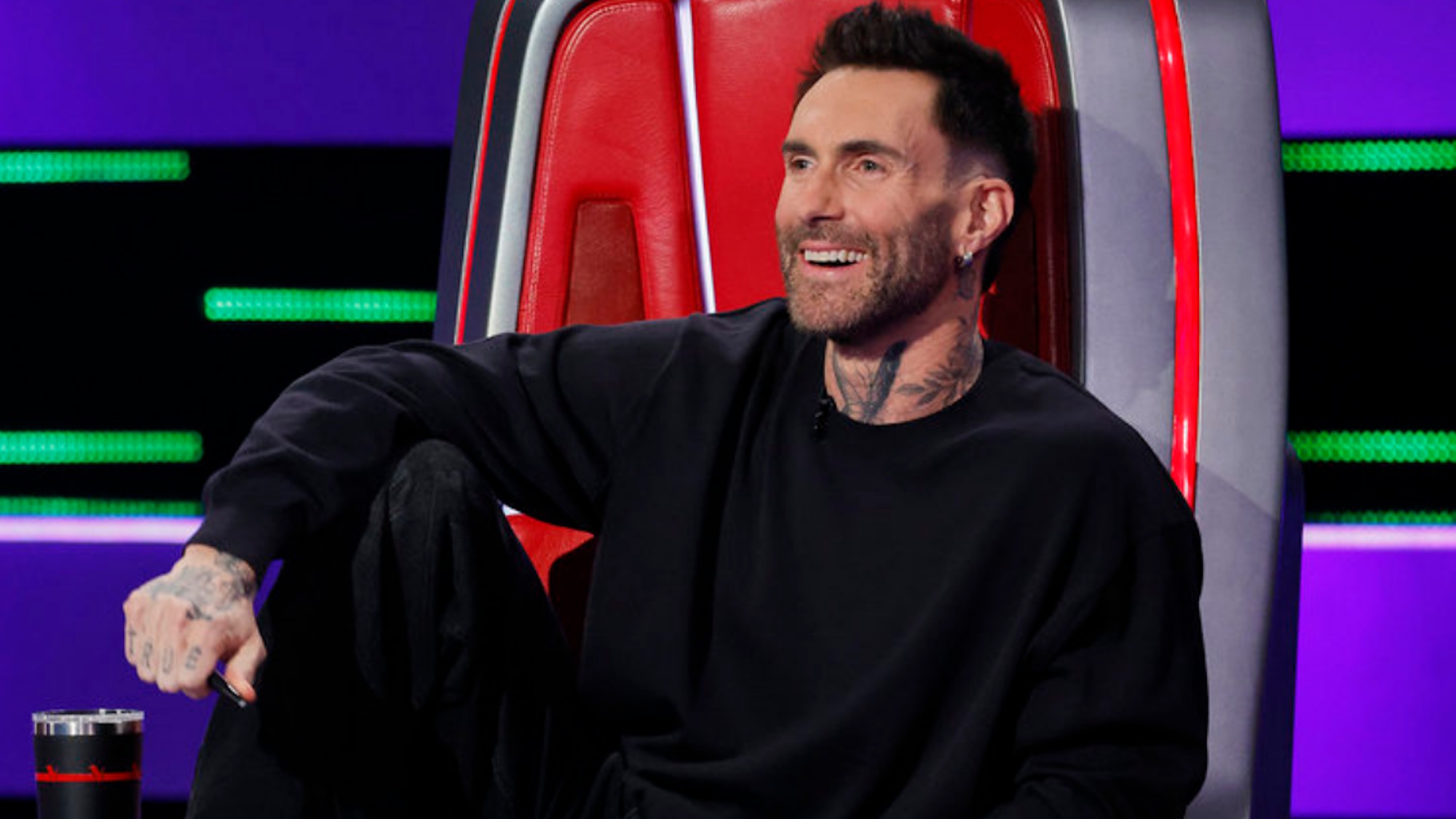Adam Levine is shown on The Voice.