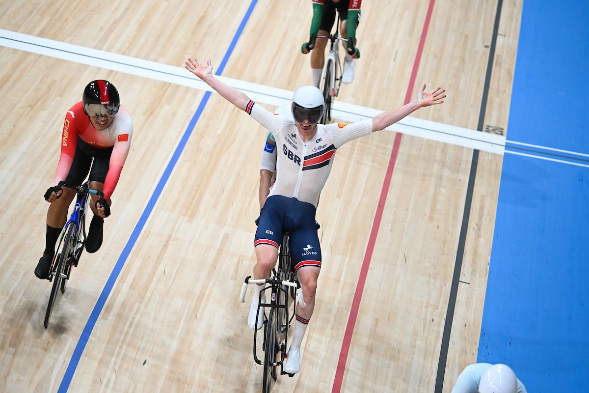 Mark Stewart celebrates winning the Points Race at the 2026 UCI Track World Championships in the Chongming Shanghai Velodrome.
