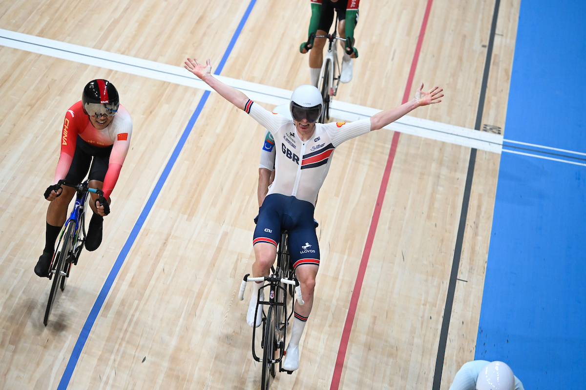Mark Stewart celebrates winning the Points Race at the 2026 UCI Track World Championships in the Chongming Shanghai Velodrome.