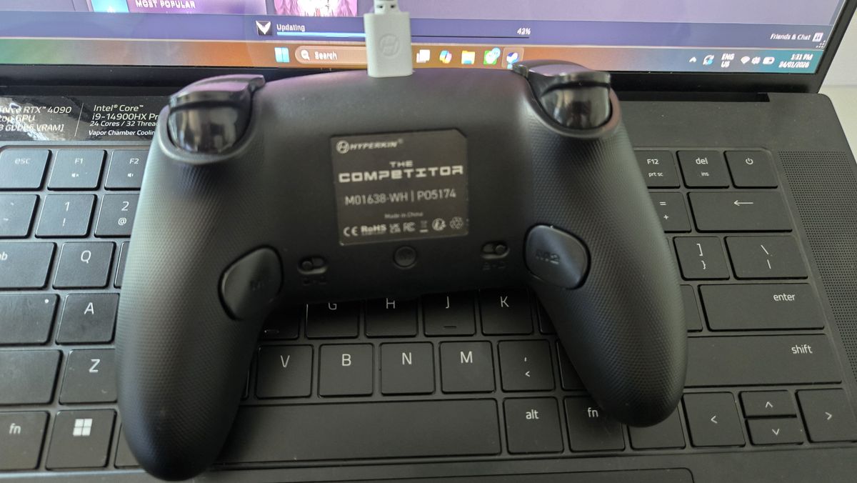 The Hyperkin Competitor on a gaming laptop.