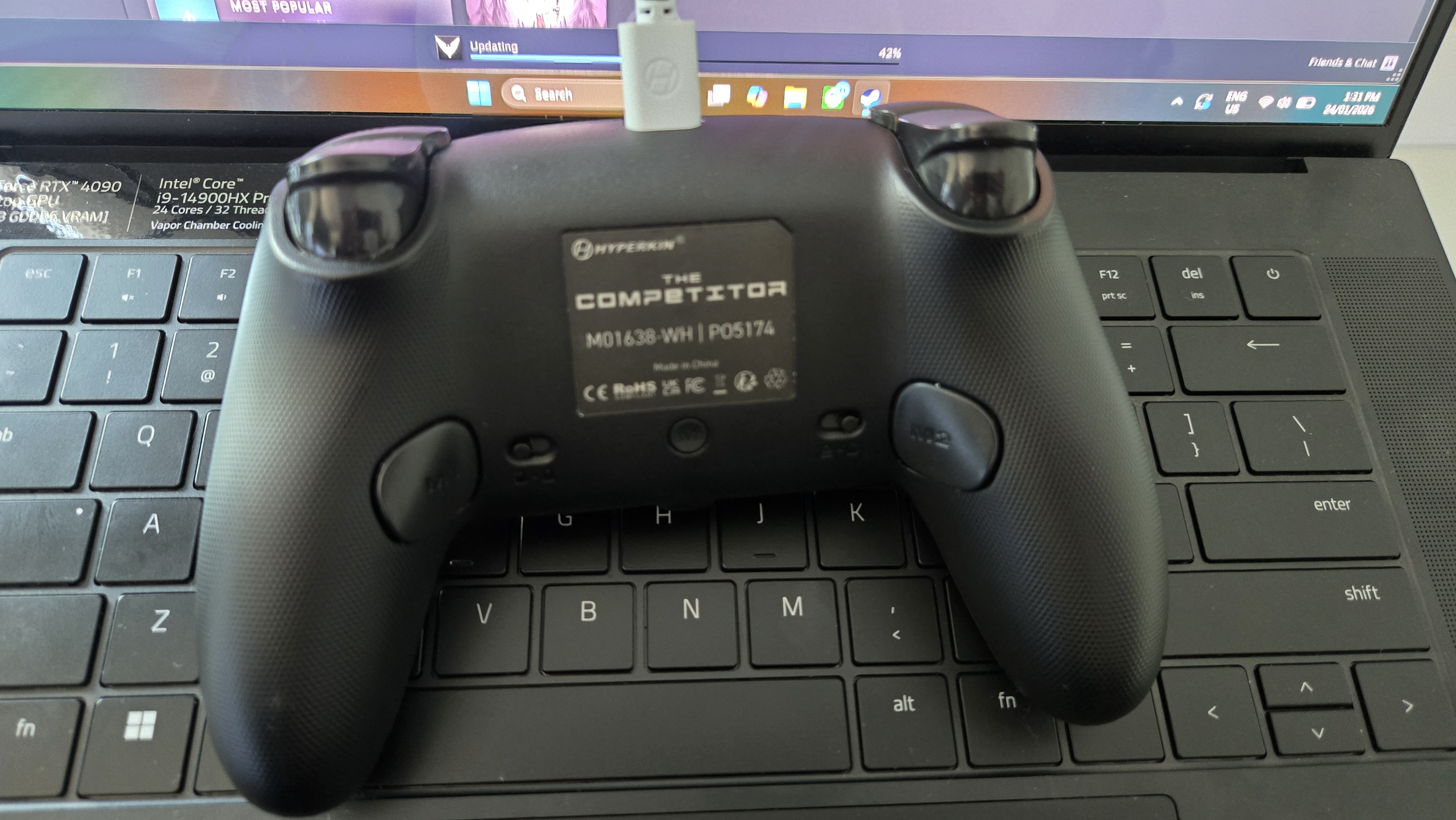 The Hyperkin Competitor on a gaming laptop.