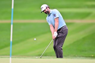 Adam Hadwin hits a chip shot