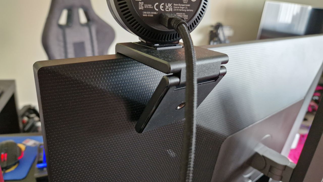 Razer Kiyo Pro Ultra sitting on a monitor from behind, showing the stand