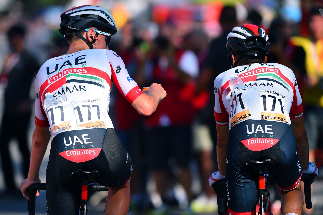 Fabio Aru gets a fist-bump from teammate Tadej Pogacar