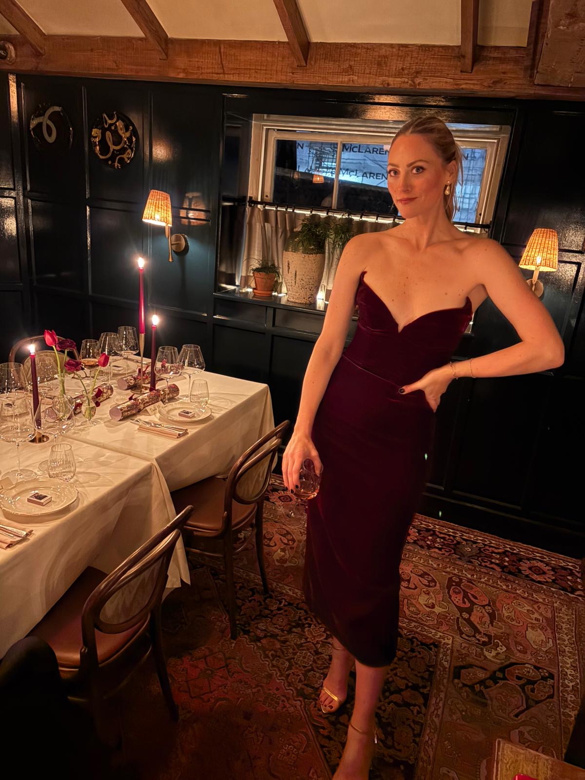 Brooke Ely Danielson wearing a black cocktail dress