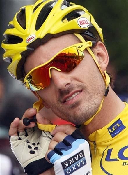 Overall leader Fabian Cancellara (Saxo Bank) adjusts his helmet