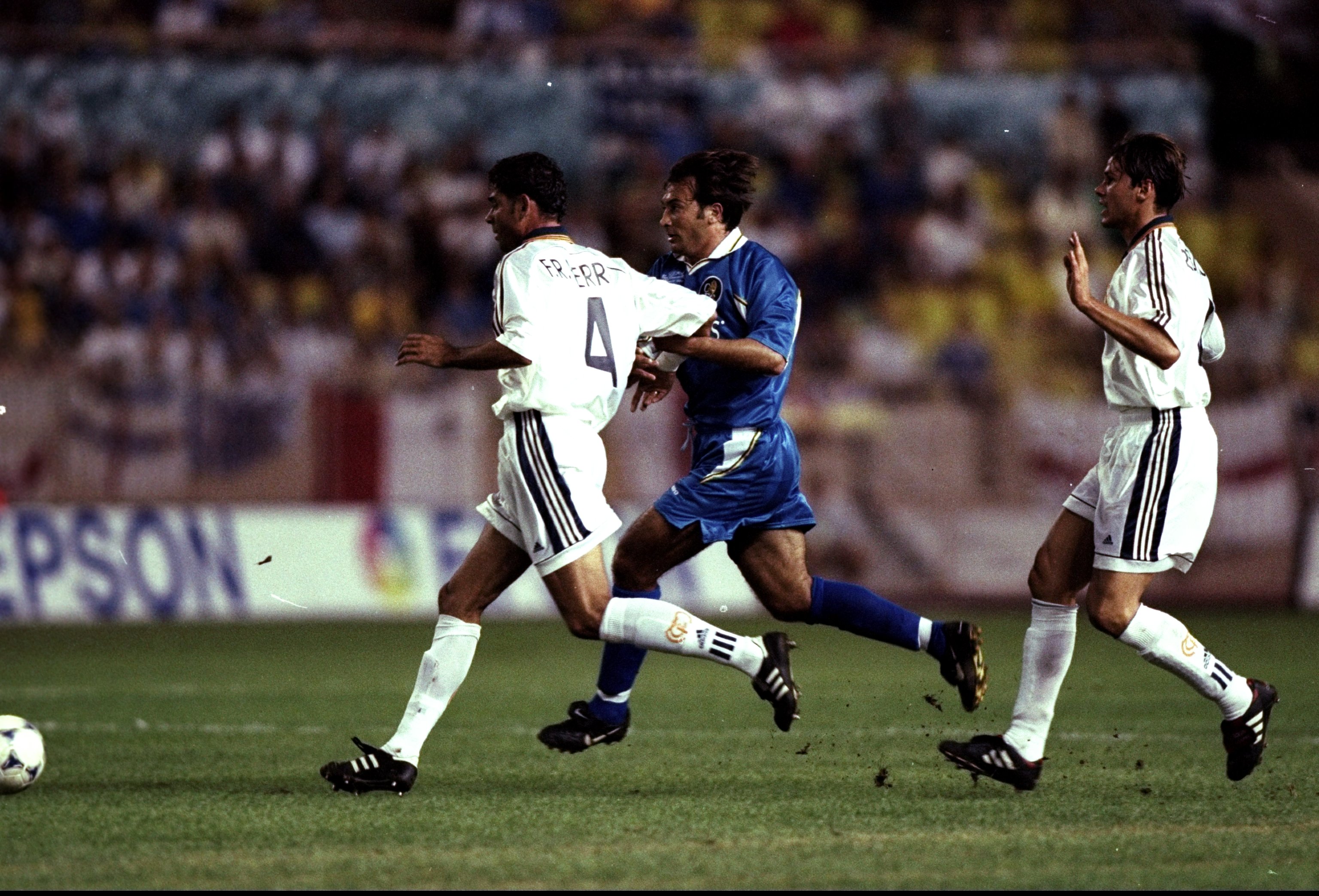 Chelsea's Pierluigi Casiraghi challenges Real Madrid's Fernando Hierro in the teams' UEFA Super Cup clash in August 1998.