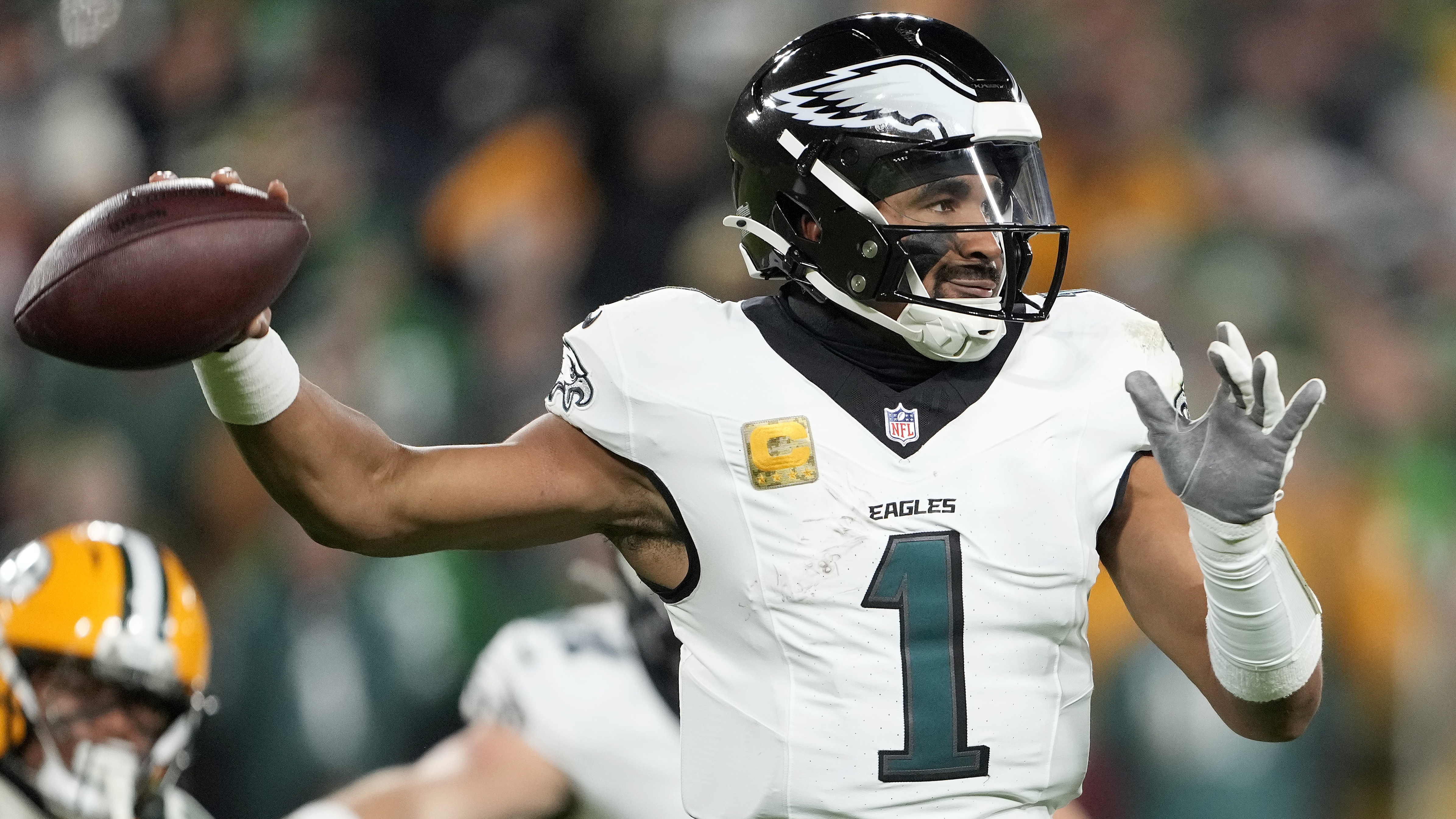 Jalen Hurts #1 of the Philadelphia Eagles throws a pass against the Green Bay Packers during the third quarter in the game at Lambeau Field on November 10, 2025 in Green Bay, Wisconsin. 