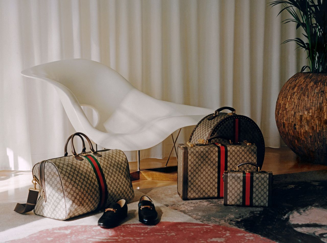 Matching Gucci luggage sets 