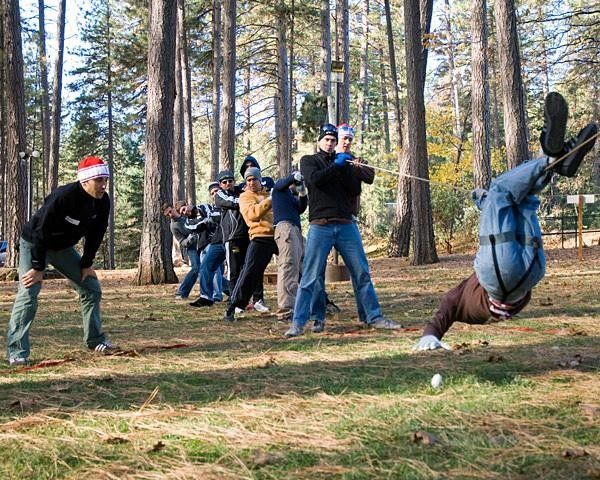 At Thursday's team building ropes course, the team hoisted blind-folded Josh Thornton over an obstacle to successfully complete a timed challenge.