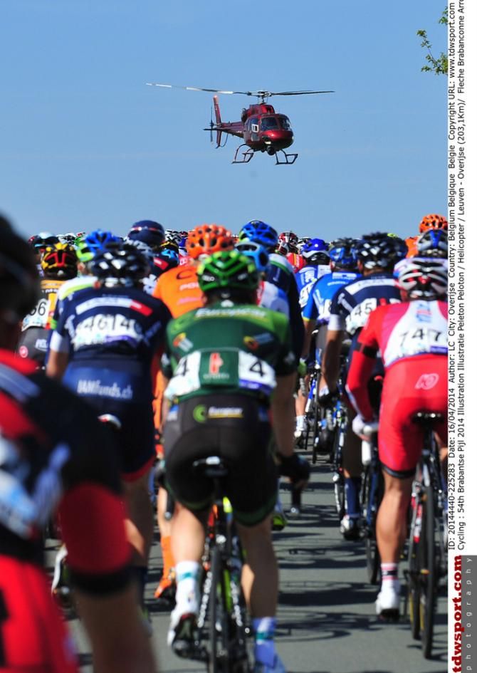 The peloton enjoying racing under blue skies
