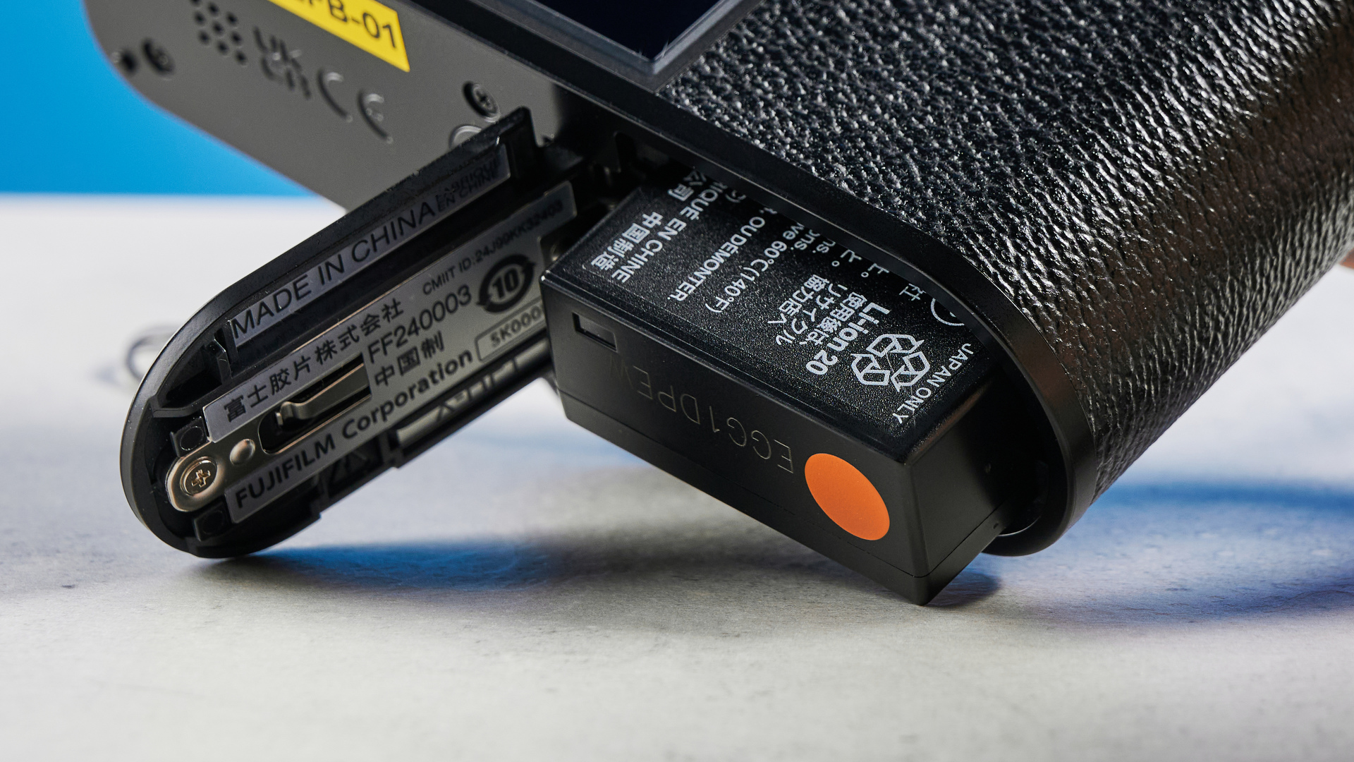 A black Fujifilm X half camera