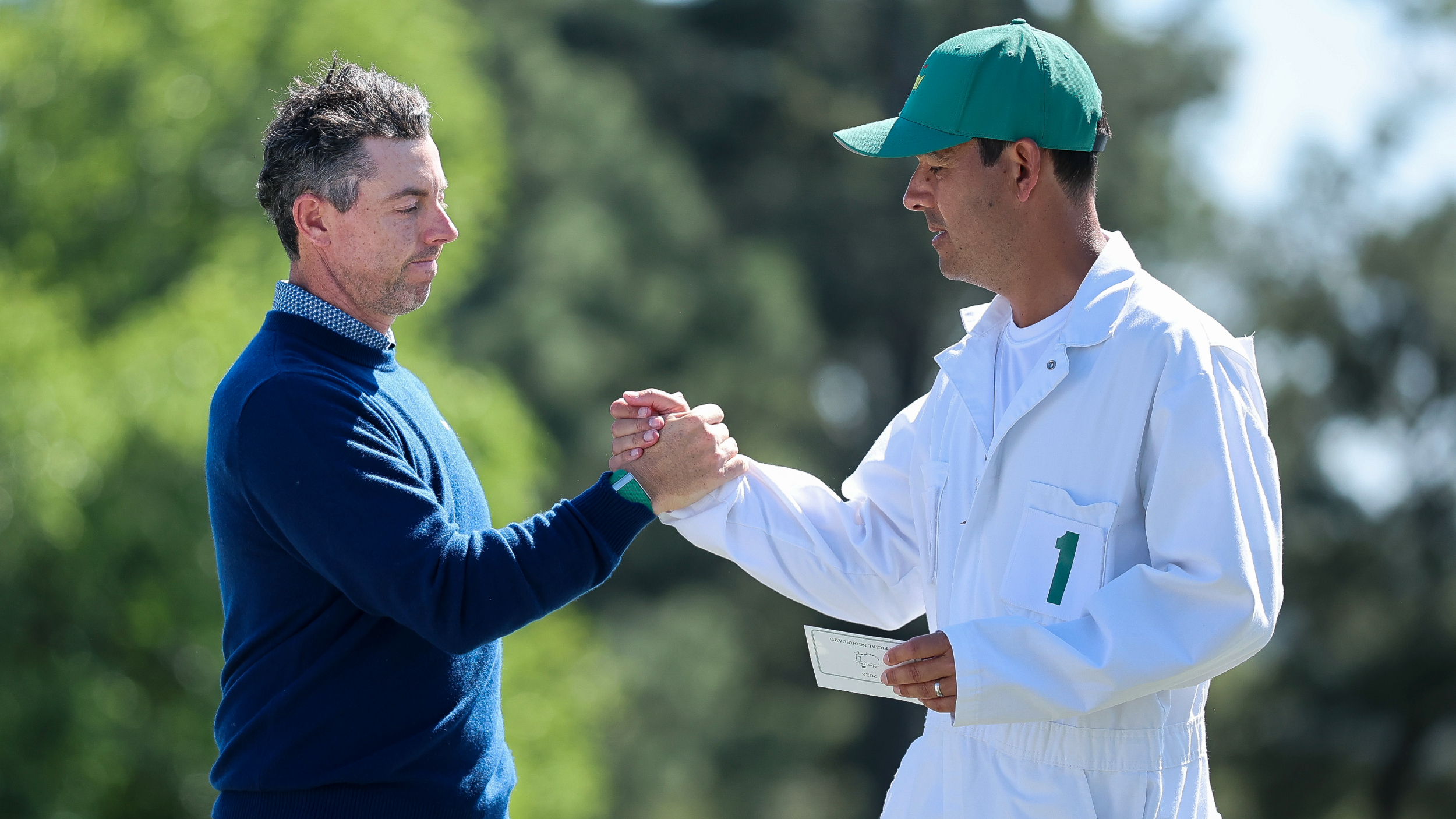 Rory McIlroy and Harry Diamond shake hands at The Masters  