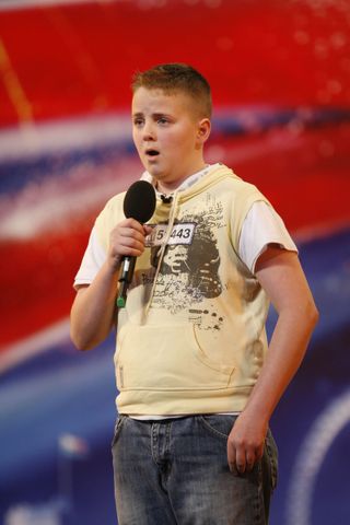 Cowell signs Britain's Got Talent choirboy