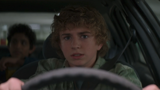 Walker Scobell driving taxi in Percy Jackson episode 6