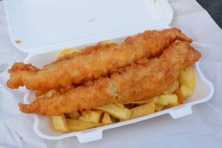 Fish and chips in a polystyrene container