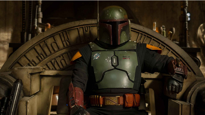 Boba Fett sat on a chair