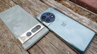 oneplus 11 and pixel 7 pro laying flat next to each other