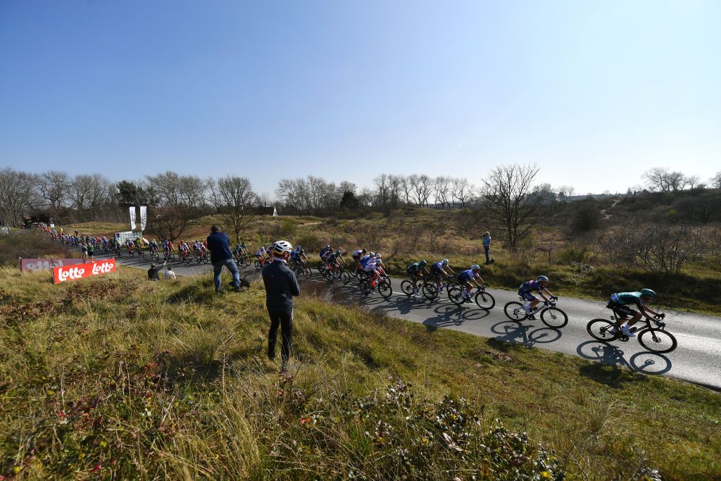 DE PANNE BELGIUM MARCH 23 Nils Politt of Germany and Team Bora Hansgrohe and a general view of the peloton competing during the 46th Minerva Classic Brugge De Panne 2022 a 2079km stage from Brugge to De Panne MinervaClassic on March 23 2022 in De Panne Belgium Photo by Luc ClaessenGetty Images