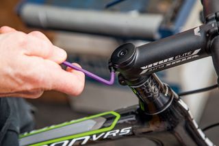 Loosen the top cap and screws to adjust your handlebar height
