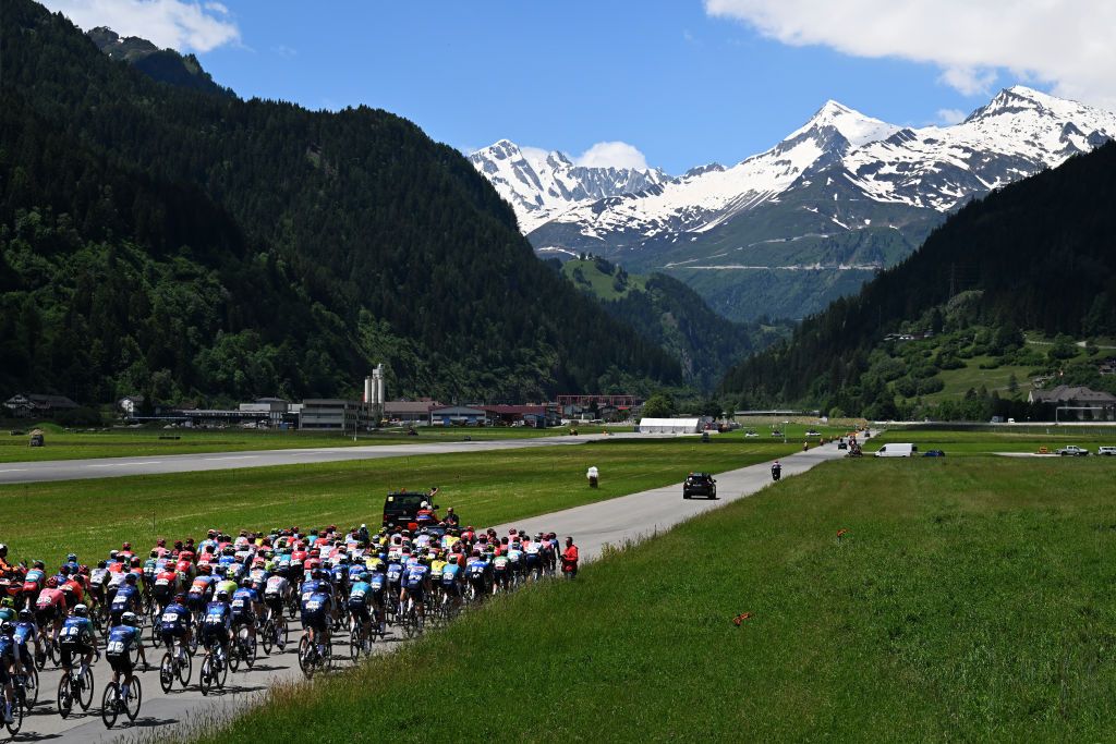 CARI SWITZERLAND JUNE 13 A general view of the peloton passing through a landscape during the 87th Tour de Suisse 2024 Stage 5 a 1486km stage from Ambri to Cari 1636m UCIWT on June 13 2024 in Cari Switzerland Photo by Tim de WaeleGetty Images