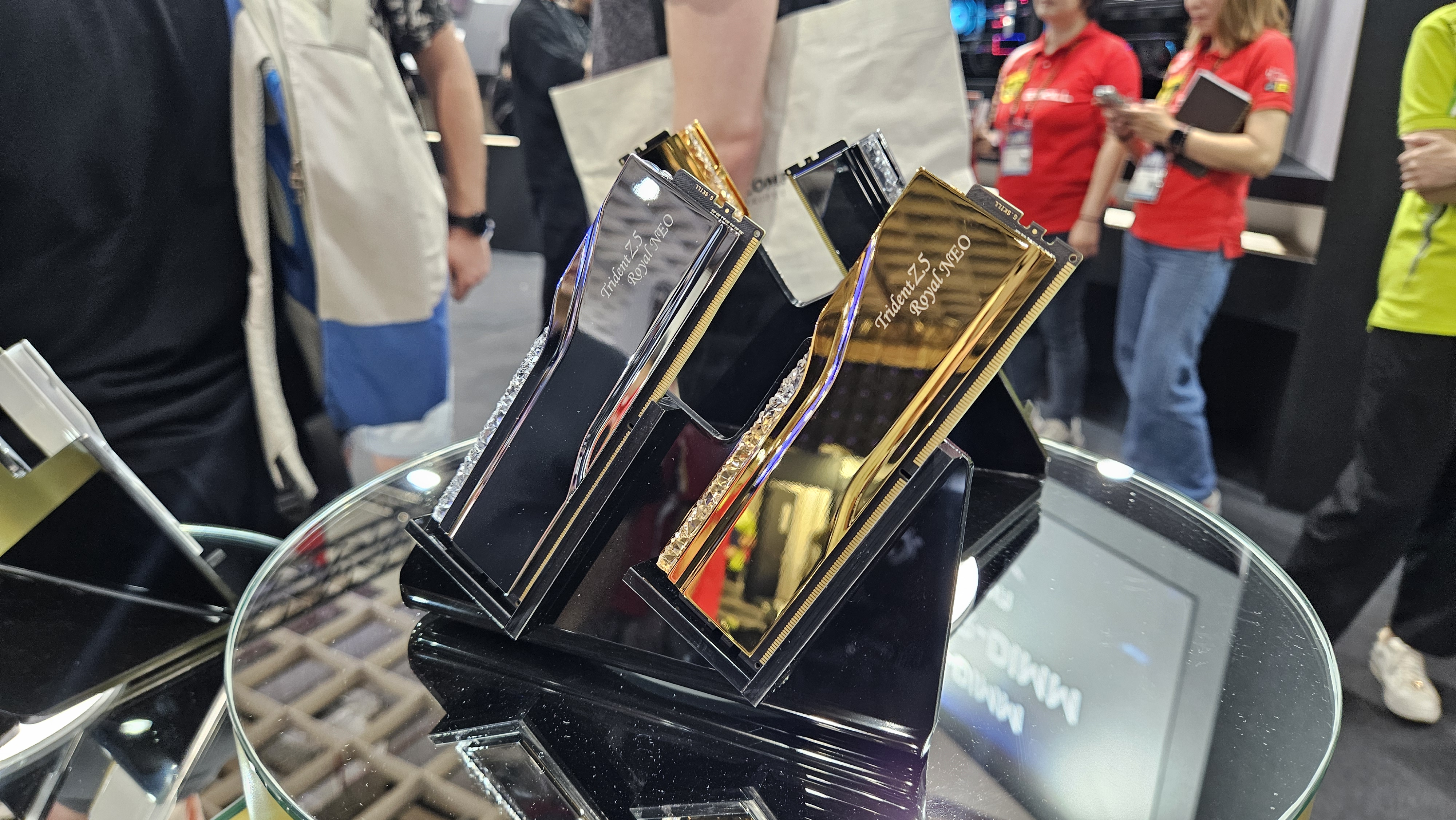 A pair of G Skill Trident Z5 Royal NEO RAM sticks in metallic gold and silver color