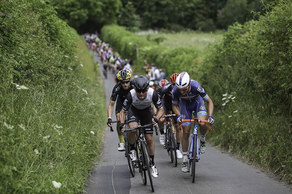 Dimension Data's Mark Cavendish leads the peloton up a hill in the Teeside countryside.