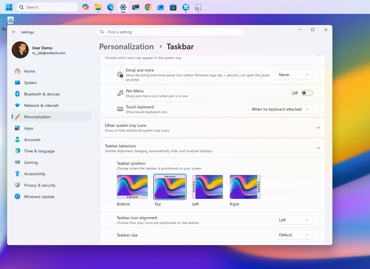 Windows 11 desktop with the Taskbar at the top and the Settings app opened in the Taskbar settings.
