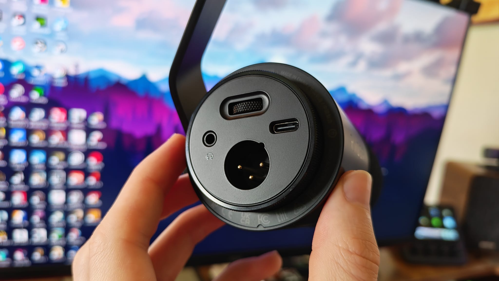 The bottom of the Razer Seiren V3 Pro, showing its connection ports