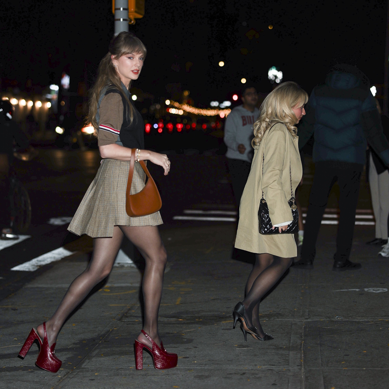 Taylor Swift and Sabrina Carpenter are seen on November 07, 2025 in New York City.