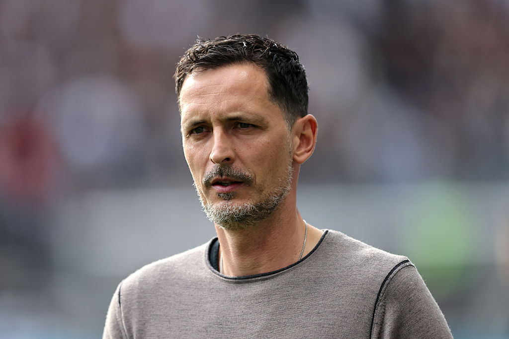 Dino Toppmoller, Head Coach of Eintracht Frankfurt, looks on prior to the Bundesliga match between Eintracht Frankfurt and RB Leipzig at Deutsche Bank Park on April 26, 2025 in Frankfurt am Main, Germany.