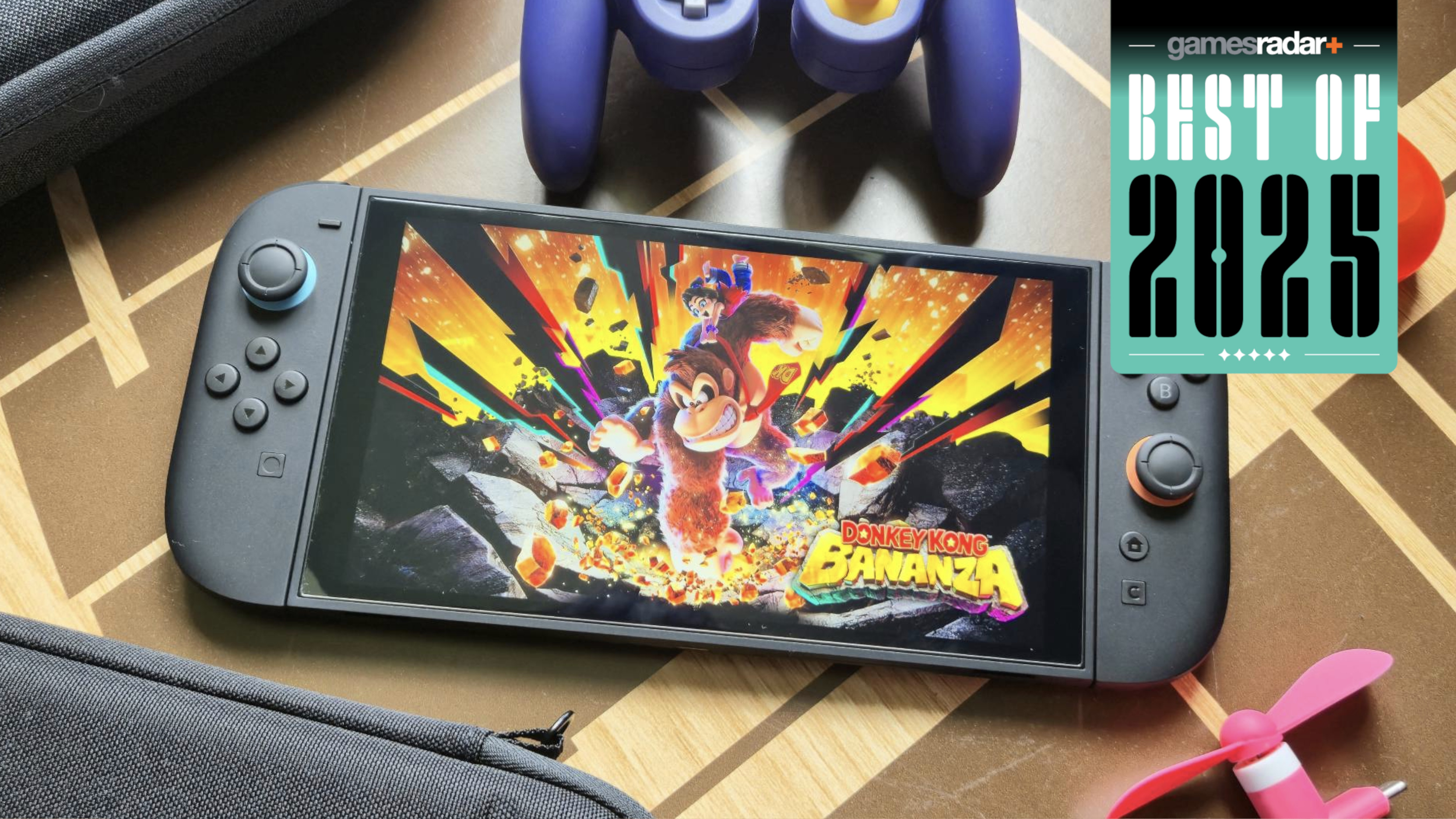 Nintendo Switch 2 on a wooden table with 'best of 2025' badge