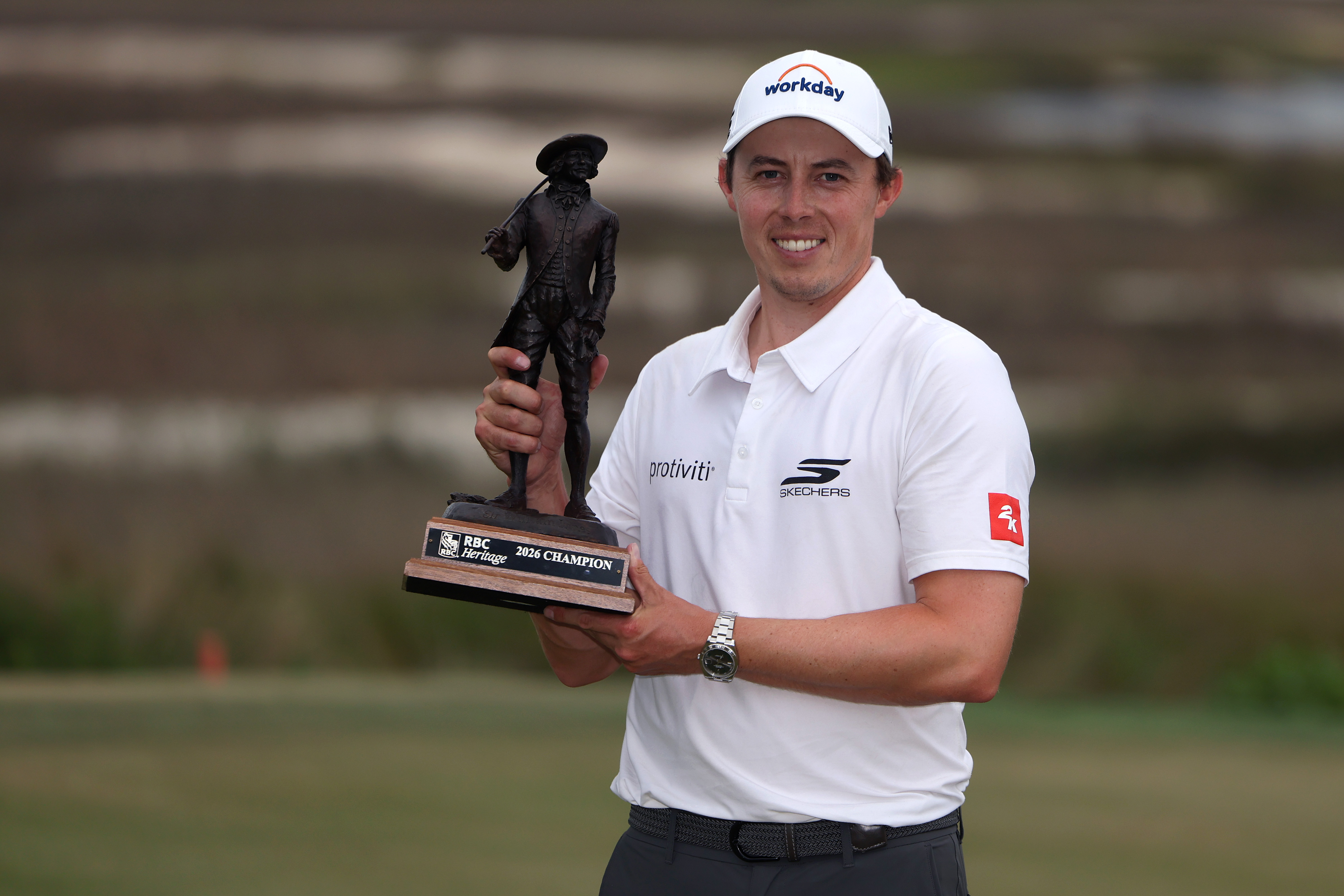 Matthew Fitzpatrick poses with the winner's trophy after winning the RBC Heritage