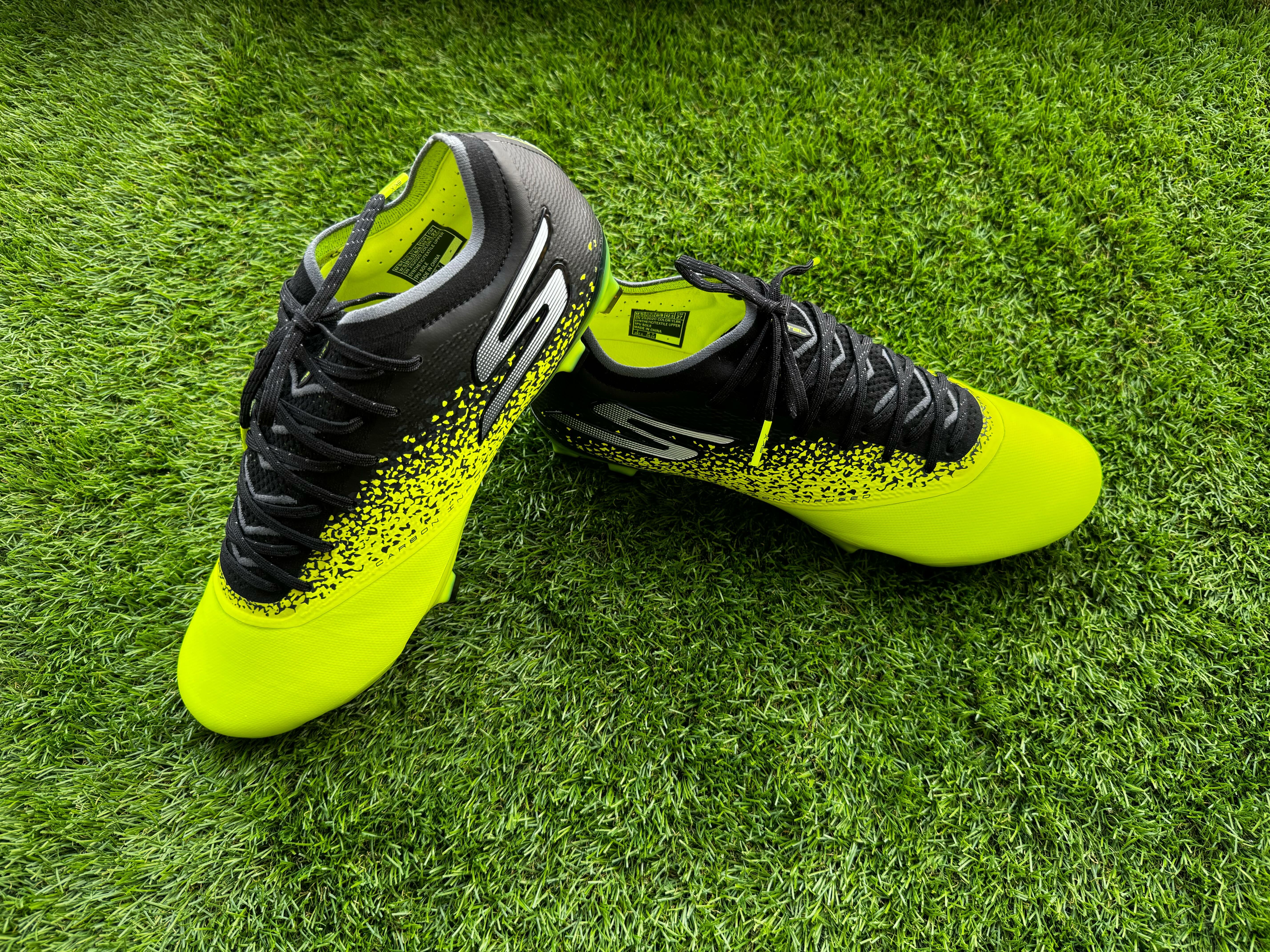 Skechers Razor Elite football boots photographed on a piece of astro turf as a comprehensive review is described