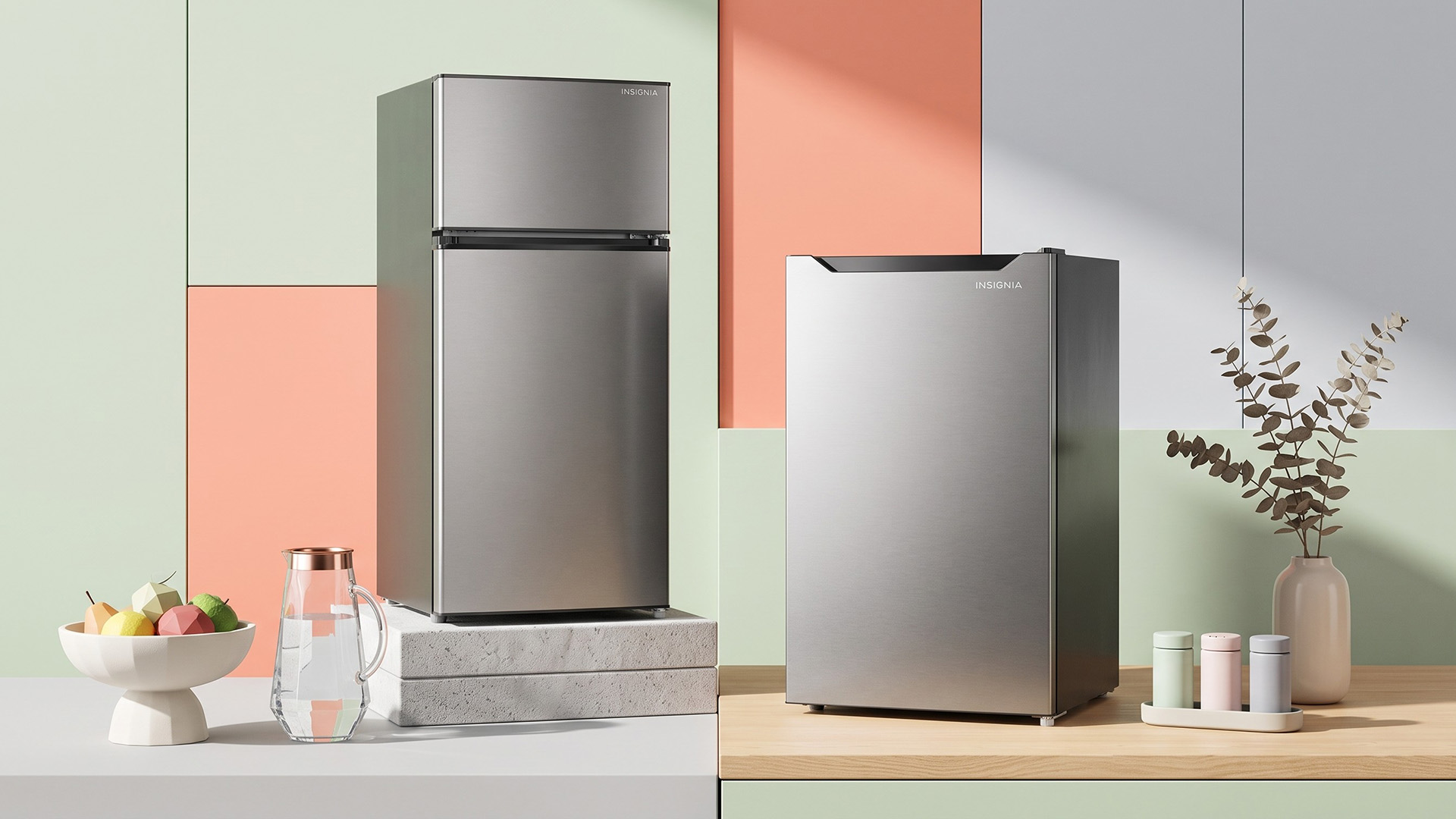 Two Insignia fridges.