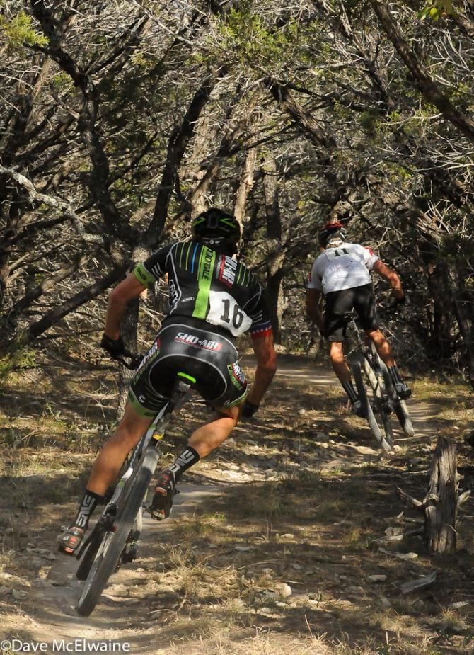 Russell Finsterwald (SRAM-Troy Lee) leads a group through the trees