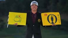 Yusaku Hosono with flags for The Masters and The Open