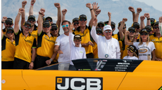 Andy Green and JCB celebrate having broken the land speed record