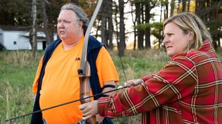 Bridget Everett in Somebody Somewhere with a bow and arrow