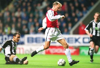 Dennis Bergkamp scores for Arsenal against Newcastle in the Premier League in March 2002.